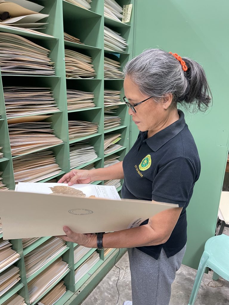 Cabinets of botanical herbarium sheets with Prof Annalee Hadsall